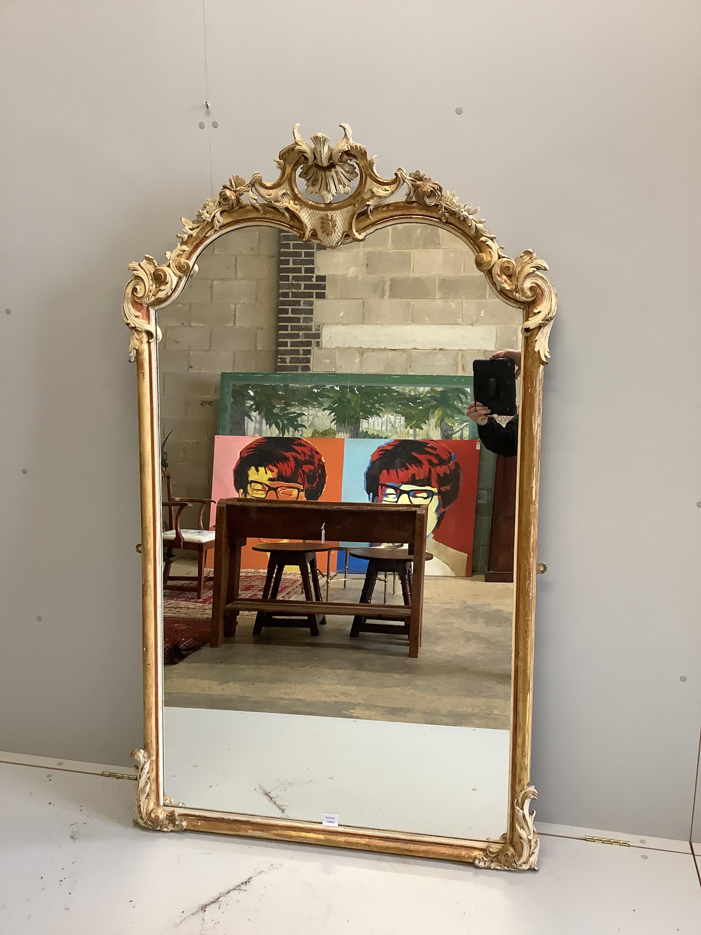 A 19th century carved wood and composition overmantel mirror, re-painted, width 104cm, height 173cm